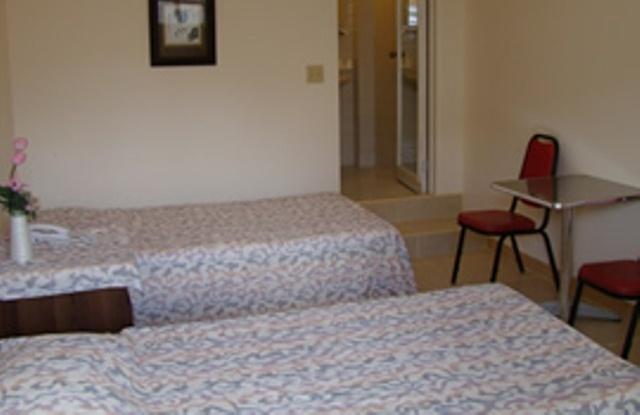 Micro Beach Hotel Garapan Værelse billede